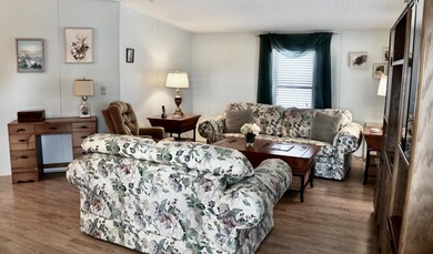 Clean, Furnished, and ready for a new owner. Just bring your on Spanish Lakes Fairways in Florida - for sale on GolfHomes.com, golf home, golf lot