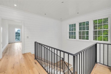 107 Saint Annie's Lane - Coastal Retreat with Lake Views on Frederica Golf Club in Georgia - for sale on GolfHomes.com, golf home, golf lot
