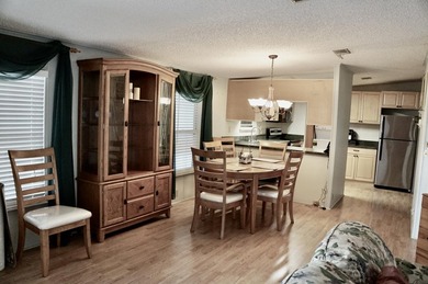 Clean, Furnished, and ready for a new owner. Just bring your on Spanish Lakes Fairways in Florida - for sale on GolfHomes.com, golf home, golf lot