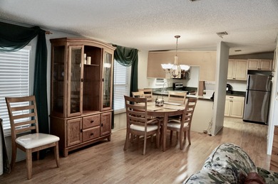 Clean, Furnished, and ready for a new owner. Just bring your on Spanish Lakes Fairways in Florida - for sale on GolfHomes.com, golf home, golf lot