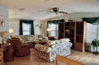 Clean, Furnished, and ready for a new owner. Just bring your on Spanish Lakes Fairways in Florida - for sale on GolfHomes.com, golf home, golf lot