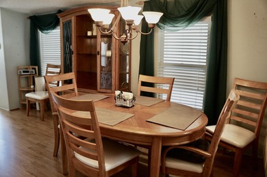 Clean, Furnished, and ready for a new owner. Just bring your on Spanish Lakes Fairways in Florida - for sale on GolfHomes.com, golf home, golf lot