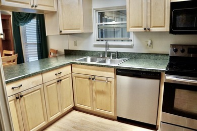 Clean, Furnished, and ready for a new owner. Just bring your on Spanish Lakes Fairways in Florida - for sale on GolfHomes.com, golf home, golf lot