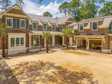 107 Saint Annie's Lane - Coastal Retreat with Lake Views on Frederica Golf Club in Georgia - for sale on GolfHomes.com, golf home, golf lot