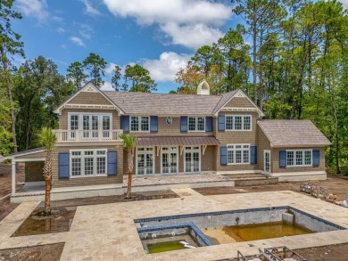 107 Saint Annie's Lane - Coastal Retreat with Lake Views on Frederica Golf Club in Georgia - for sale on GolfHomes.com, golf home, golf lot
