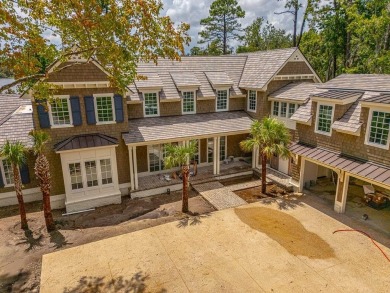 107 Saint Annie's Lane - Coastal Retreat with Lake Views on Frederica Golf Club in Georgia - for sale on GolfHomes.com, golf home, golf lot