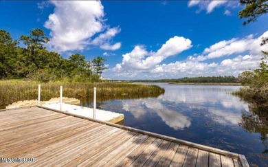 Discover the perfect blend of comfort, convenience, and coastal on Gulf Hills Golf Club in Mississippi - for sale on GolfHomes.com, golf home, golf lot