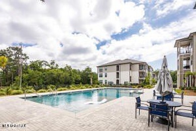 Discover the perfect blend of comfort, convenience, and coastal on Gulf Hills Golf Club in Mississippi - for sale on GolfHomes.com, golf home, golf lot