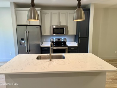 Discover the perfect blend of comfort, convenience, and coastal on Gulf Hills Golf Club in Mississippi - for sale on GolfHomes.com, golf home, golf lot