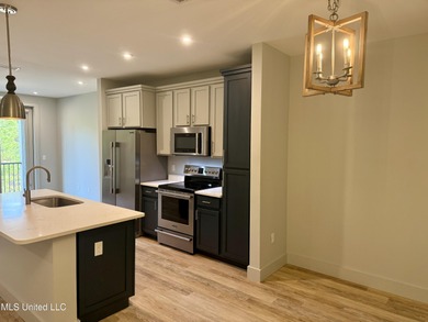 Discover the perfect blend of comfort, convenience, and coastal on Gulf Hills Golf Club in Mississippi - for sale on GolfHomes.com, golf home, golf lot