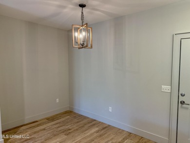 Discover the perfect blend of comfort, convenience, and coastal on Gulf Hills Golf Club in Mississippi - for sale on GolfHomes.com, golf home, golf lot