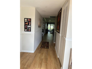 Welcome home, great home for entertainment, Lakefront property on Pembroke Lakes Golf Club in Florida - for sale on GolfHomes.com, golf home, golf lot