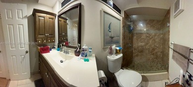 Welcome home, great home for entertainment, Lakefront property on Pembroke Lakes Golf Club in Florida - for sale on GolfHomes.com, golf home, golf lot