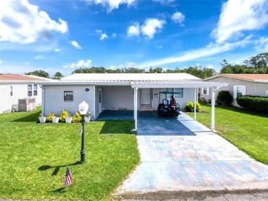 NO LOT RENT! Location, location, location....this beautifully on Sweetwater Golf and Tennis Club in Florida - for sale on GolfHomes.com, golf home, golf lot