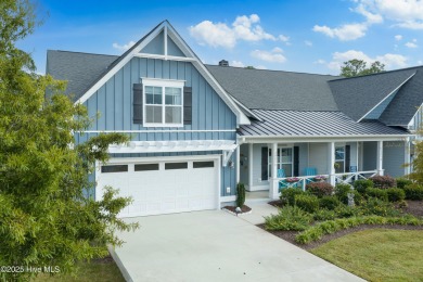This stunning home in The Towns of St. James Plantation offers on Members Club At St. James Plantation in North Carolina - for sale on GolfHomes.com, golf home, golf lot