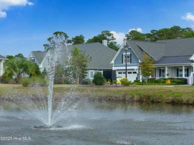 This stunning home in The Towns of St. James Plantation offers on Members Club At St. James Plantation in North Carolina - for sale on GolfHomes.com, golf home, golf lot