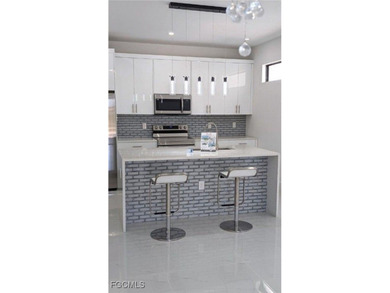 Secure this stunning new construction home while it's still in on Burnt Store Golf Club in Florida - for sale on GolfHomes.com, golf home, golf lot