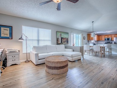 LOCATION is everything with this 2/2 block and stucco Woodlawn on Bacall Executive Golf Course in Florida - for sale on GolfHomes.com, golf home, golf lot