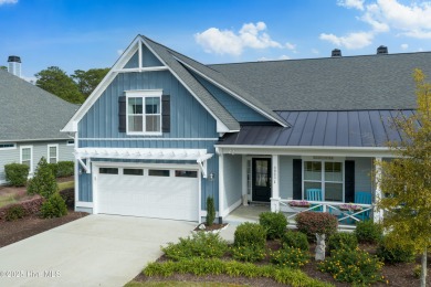 This stunning home in The Towns of St. James Plantation offers on Members Club At St. James Plantation in North Carolina - for sale on GolfHomes.com, golf home, golf lot
