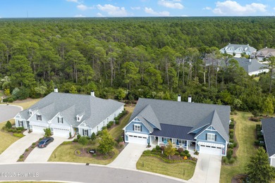 This stunning home in The Towns of St. James Plantation offers on Members Club At St. James Plantation in North Carolina - for sale on GolfHomes.com, golf home, golf lot
