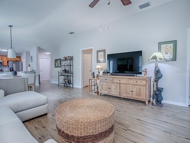 LOCATION is everything with this 2/2 block and stucco Woodlawn on Bacall Executive Golf Course in Florida - for sale on GolfHomes.com, golf home, golf lot