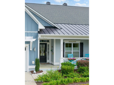 This stunning home in The Towns of St. James Plantation offers on Members Club At St. James Plantation in North Carolina - for sale on GolfHomes.com, golf home, golf lot