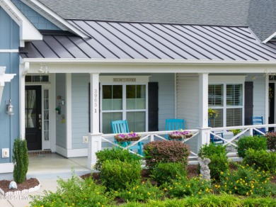 This stunning home in The Towns of St. James Plantation offers on Members Club At St. James Plantation in North Carolina - for sale on GolfHomes.com, golf home, golf lot