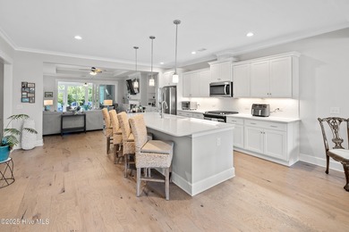 This stunning home in The Towns of St. James Plantation offers on Members Club At St. James Plantation in North Carolina - for sale on GolfHomes.com, golf home, golf lot