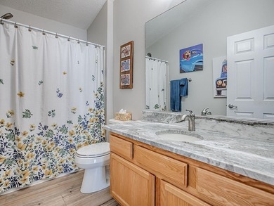 LOCATION is everything with this 2/2 block and stucco Woodlawn on Bacall Executive Golf Course in Florida - for sale on GolfHomes.com, golf home, golf lot