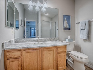 LOCATION is everything with this 2/2 block and stucco Woodlawn on Bacall Executive Golf Course in Florida - for sale on GolfHomes.com, golf home, golf lot
