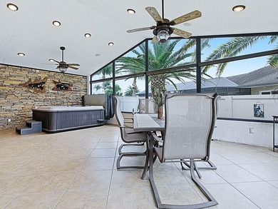 LOCATION is everything with this 2/2 block and stucco Woodlawn on Bacall Executive Golf Course in Florida - for sale on GolfHomes.com, golf home, golf lot