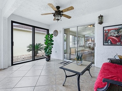 LOCATION is everything with this 2/2 block and stucco Woodlawn on Bacall Executive Golf Course in Florida - for sale on GolfHomes.com, golf home, golf lot