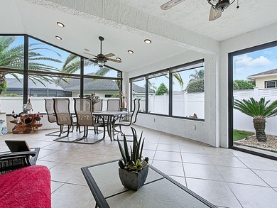 LOCATION is everything with this 2/2 block and stucco Woodlawn on Bacall Executive Golf Course in Florida - for sale on GolfHomes.com, golf home, golf lot