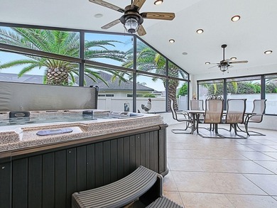 LOCATION is everything with this 2/2 block and stucco Woodlawn on Bacall Executive Golf Course in Florida - for sale on GolfHomes.com, golf home, golf lot