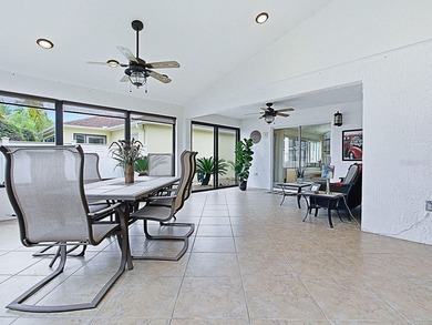 LOCATION is everything with this 2/2 block and stucco Woodlawn on Bacall Executive Golf Course in Florida - for sale on GolfHomes.com, golf home, golf lot