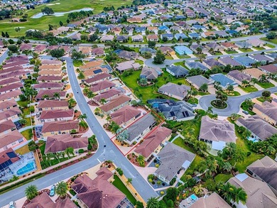 LOCATION is everything with this 2/2 block and stucco Woodlawn on Bacall Executive Golf Course in Florida - for sale on GolfHomes.com, golf home, golf lot