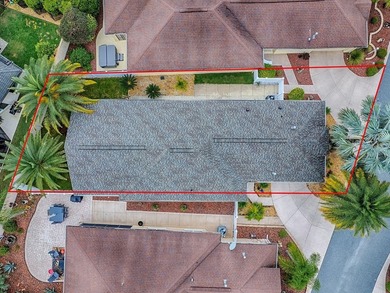 LOCATION is everything with this 2/2 block and stucco Woodlawn on Bacall Executive Golf Course in Florida - for sale on GolfHomes.com, golf home, golf lot