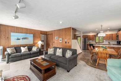 Pride of ownership shines throughout this original owner turnkey on Crystal Mountain Golf Course in Michigan - for sale on GolfHomes.com, golf home, golf lot