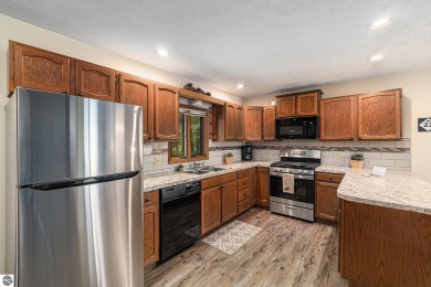 Pride of ownership shines throughout this original owner turnkey on Crystal Mountain Golf Course in Michigan - for sale on GolfHomes.com, golf home, golf lot