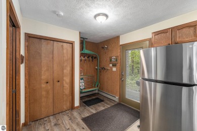Pride of ownership shines throughout this original owner turnkey on Crystal Mountain Golf Course in Michigan - for sale on GolfHomes.com, golf home, golf lot