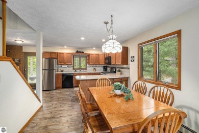 Pride of ownership shines throughout this original owner turnkey on Crystal Mountain Golf Course in Michigan - for sale on GolfHomes.com, golf home, golf lot