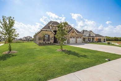 This highly sought-after single-story Altura Aspen floorplan is on Heath Golf and Yacht Club in Texas - for sale on GolfHomes.com, golf home, golf lot