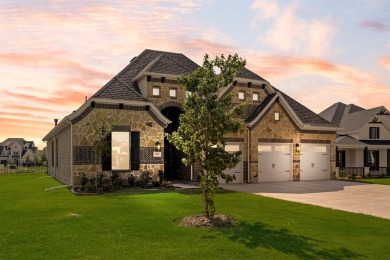 This highly sought-after single-story Altura Aspen floorplan is on Heath Golf and Yacht Club in Texas - for sale on GolfHomes.com, golf home, golf lot