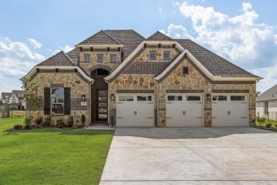This highly sought-after single-story Altura Aspen floorplan is on Heath Golf and Yacht Club in Texas - for sale on GolfHomes.com, golf home, golf lot
