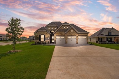 This highly sought-after single-story Altura Aspen floorplan is on Heath Golf and Yacht Club in Texas - for sale on GolfHomes.com, golf home, golf lot