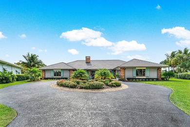 Stunning complete renovation in the highly desirable, gated City on Atlantis Golf Club in Florida - for sale on GolfHomes.com, golf home, golf lot