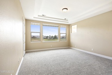 Located on the 4th hole of Dayton Valley Golf Club, this home on Dayton Valley Golf Club At Legado in Nevada - for sale on GolfHomes.com, golf home, golf lot
