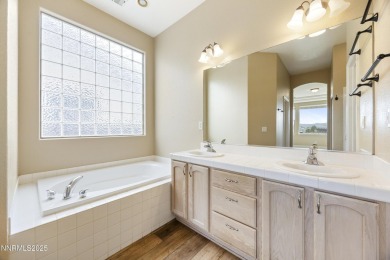 Located on the 4th hole of Dayton Valley Golf Club, this home on Dayton Valley Golf Club At Legado in Nevada - for sale on GolfHomes.com, golf home, golf lot