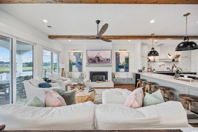 Welcome home to 400 W. Palms Drive, where waterway living is on Myrtlewood Golf Course and Club  in South Carolina - for sale on GolfHomes.com, golf home, golf lot