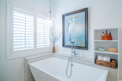 Discover a stunning 4-bedroom waterfront home in the prestigious on Heritage Club in South Carolina - for sale on GolfHomes.com, golf home, golf lot